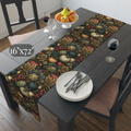 a dining table set with a table runner, plates, silverware, and a bowl of fruit.