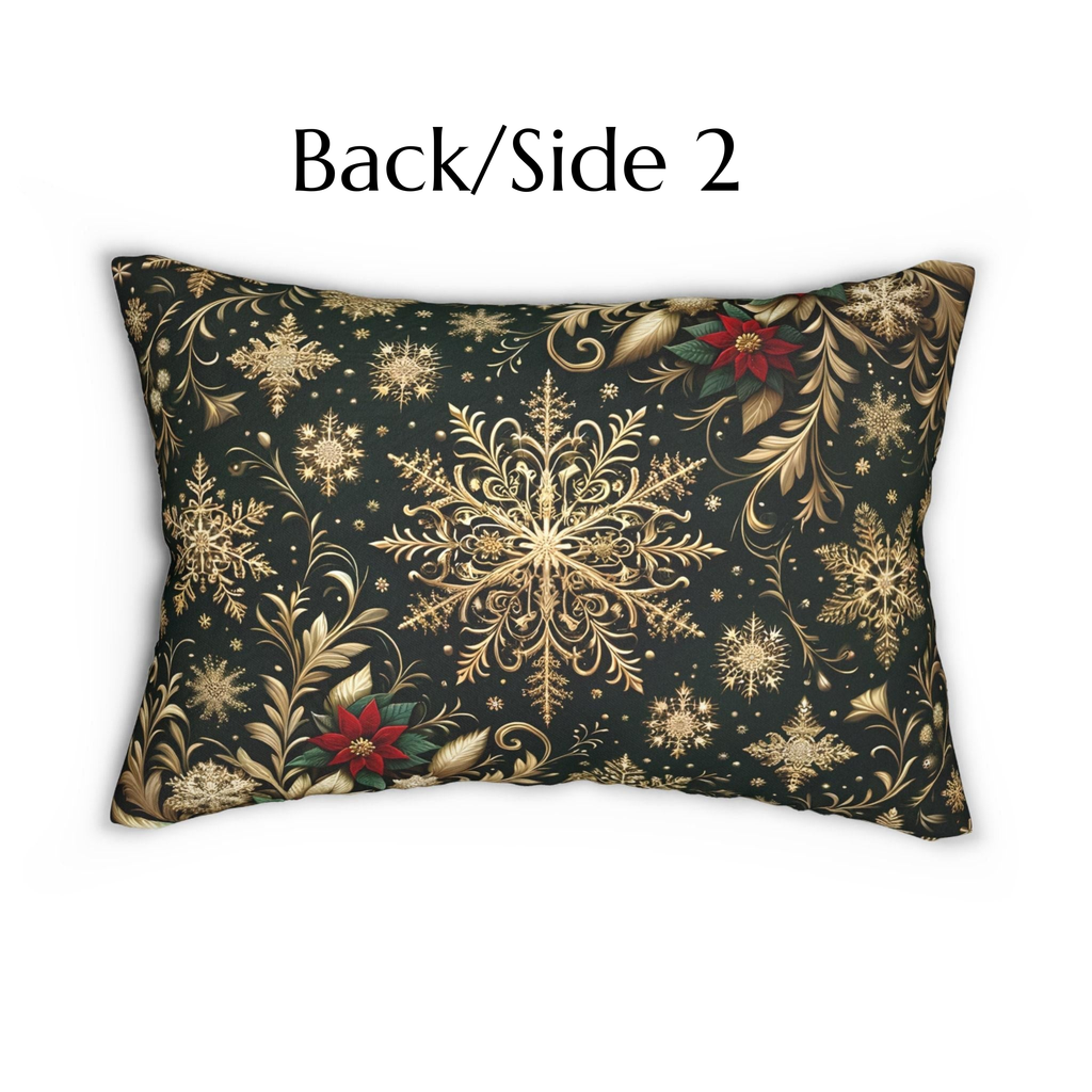 A decorative pillow with a black background and a gold and red floral pattern.