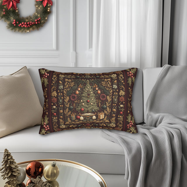 a cozy living room decorated for Christmas. A large, ornate pillow with a Christmas tree design sits on a white couch, surrounded by a wreath, ornaments, and a gray blanket. In the background, a glass coffee table holds a few ornaments, and a window with white curtains lets in natural light, creating a warm and festive atmosphere.