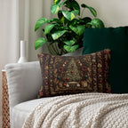 a cozy living space with a gray sofa adorned with a decorative pillow featuring a Christmas tree and ornaments. The sofa is positioned next to a large potted plant, creating a warm and inviting atmosphere.