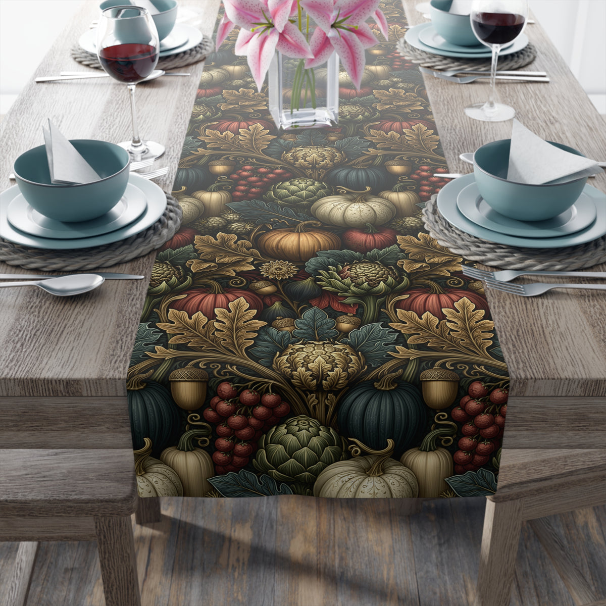 a table set for a meal, with a table runner featuring a vibrant autumnal pattern of various fruits and vegetables, including pumpkins, apples, and grapes. The table is set with plates, bowls, and silverware, and there are wine glasses and a vase of flowers on the table.
