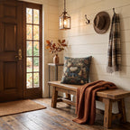 a cozy entryway with a wooden bench, a decorative pillow, a hat rack, and a vase of autumn leaves. The wooden floor and white walls create a warm and inviting atmosphere.