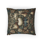 a square throw pillow with a detailed floral and leaf pattern in shades of green, brown, and white.