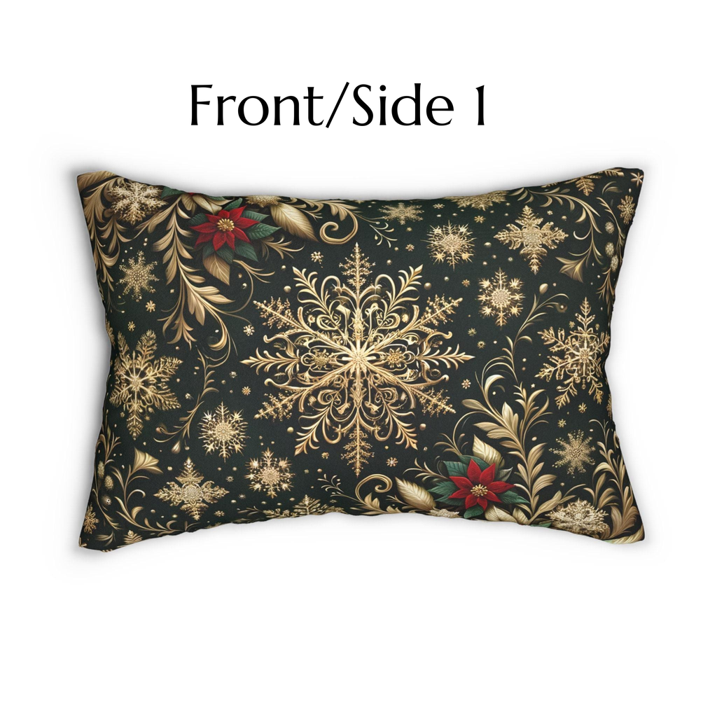 A decorative pillow with a black background and gold floral and snowflake patterns.